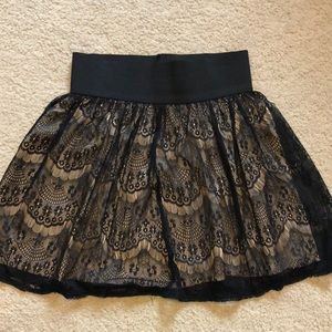 Black lace skirt with rose slip